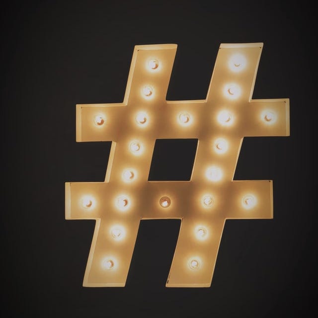 Hashtag symbol on black background