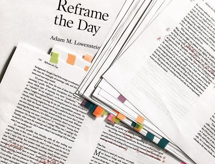 A photograph of pages of "Reframe the Day."