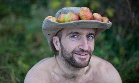 Mark Boyle with apples on his hat.