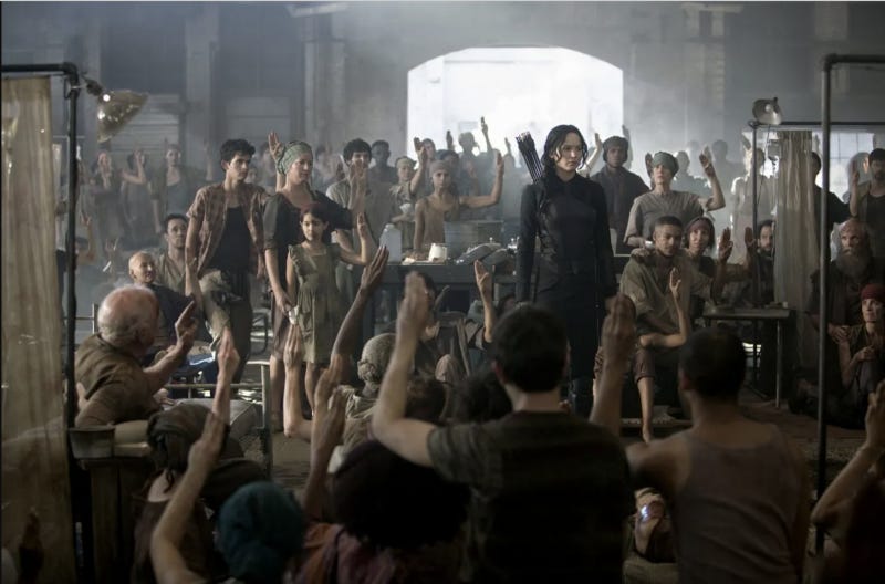 Still shot of Jennifer Lawrence in the Hunger Games in stunning dystopian fashion