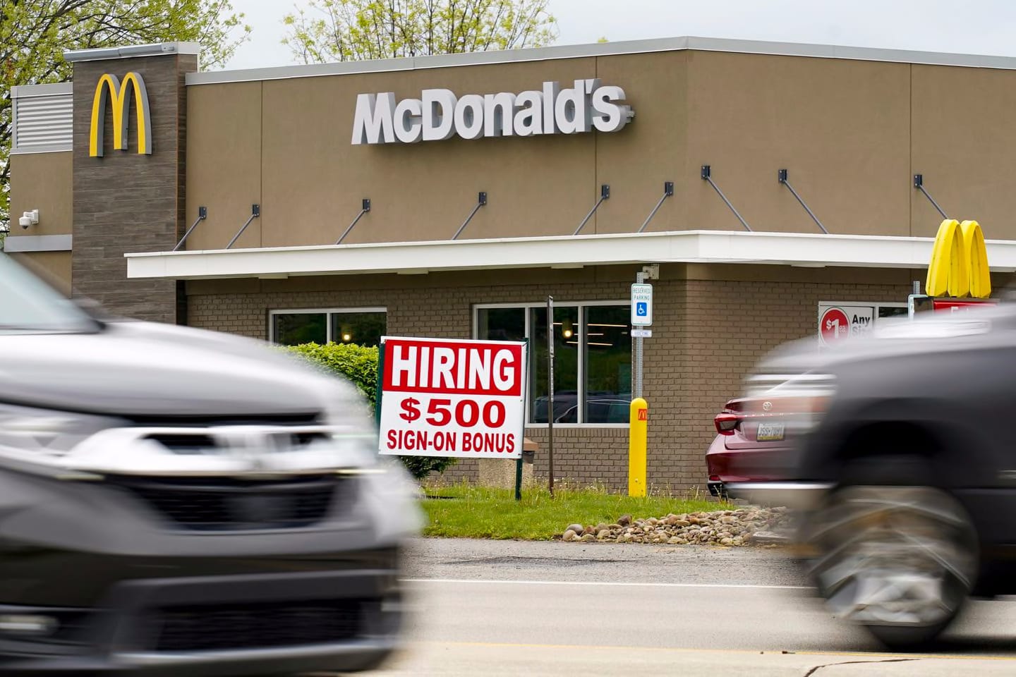 A hiring sign offered a $500 bonus outside a McDonald's restaurant, in Cranberry Township, Butler County, Pa. on May 5, 2021.