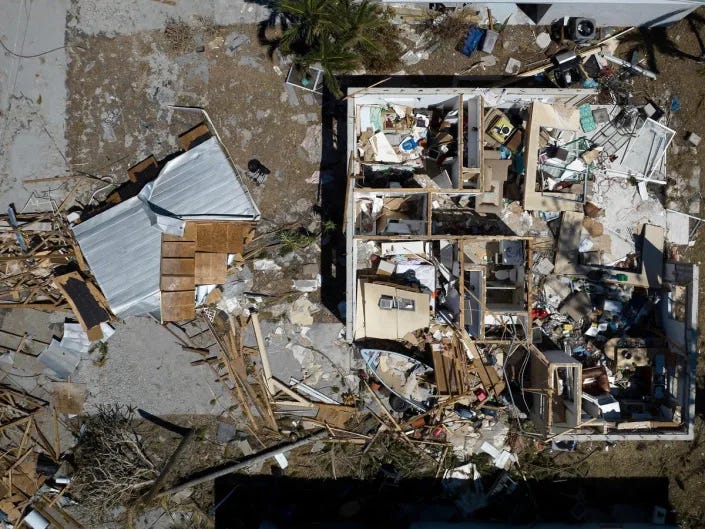 An aerial picture taken on 3 October, 2022 shows a destroyed house in the aftermath of Hurricane Ian in West Inland, Matlacha, Florida (Getty Images)