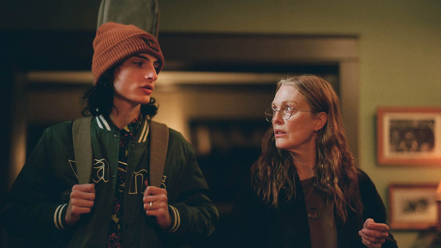 film still from "when you finish saving the world" depicting finn wolfhard and julianne moore.