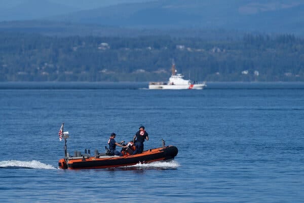 U.S. Coast Guard vessels searched near Freeland, Wash., on Monday. A seaplane carrying 10 people crashed on Sunday en route to Renton, Wash. 
