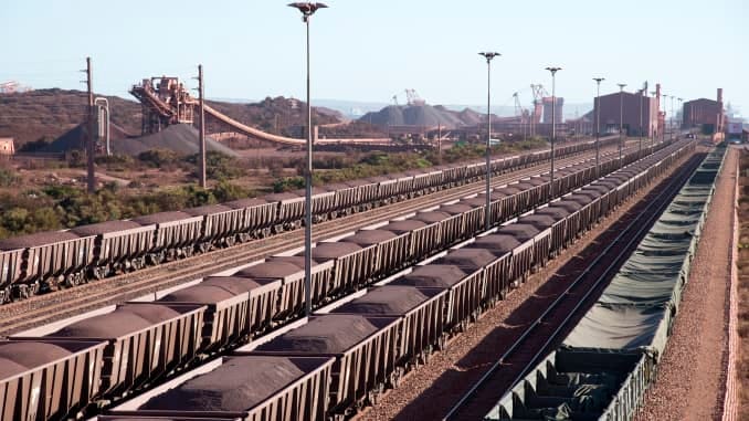 Iron ore on railway wagons at Salanaha Bay Terminal in South Africa.