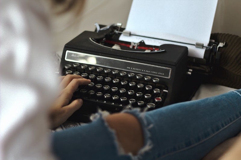 girl using a typewriter