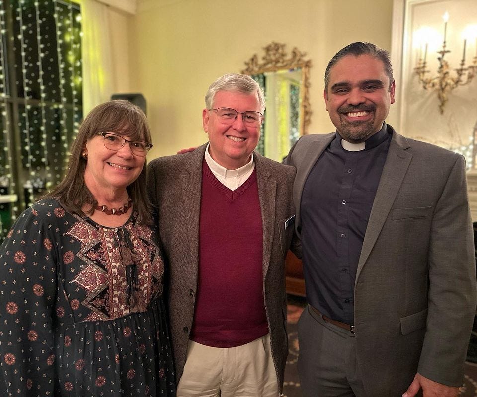 May be an image of 3 people, people standing and indoor