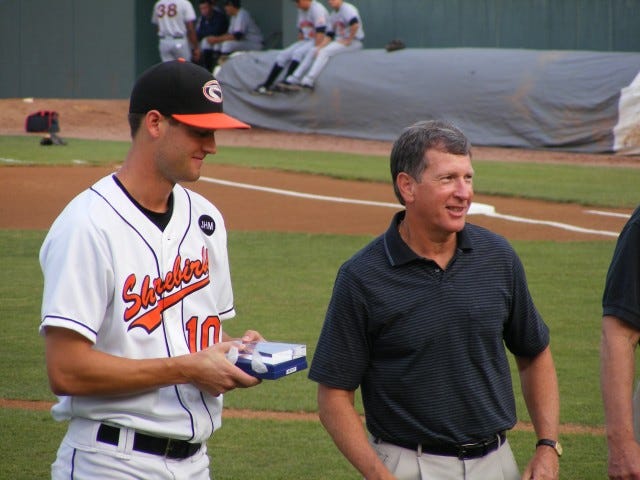 Jacob Julius accepting a Humanitarian Award from Mountaire Farms as part of pregame ceremonies on Mountaire Faith and Family Day August 8th. Photo by Kim Corkran.