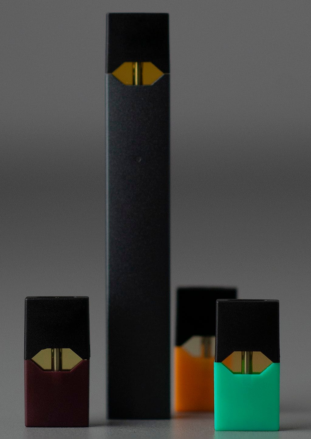 Juul vaping device with pods (cropped).jpg