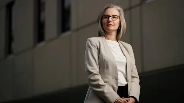First woman to head an Australian intelligence agency said a spy chief she had been asked to bring men coffee.