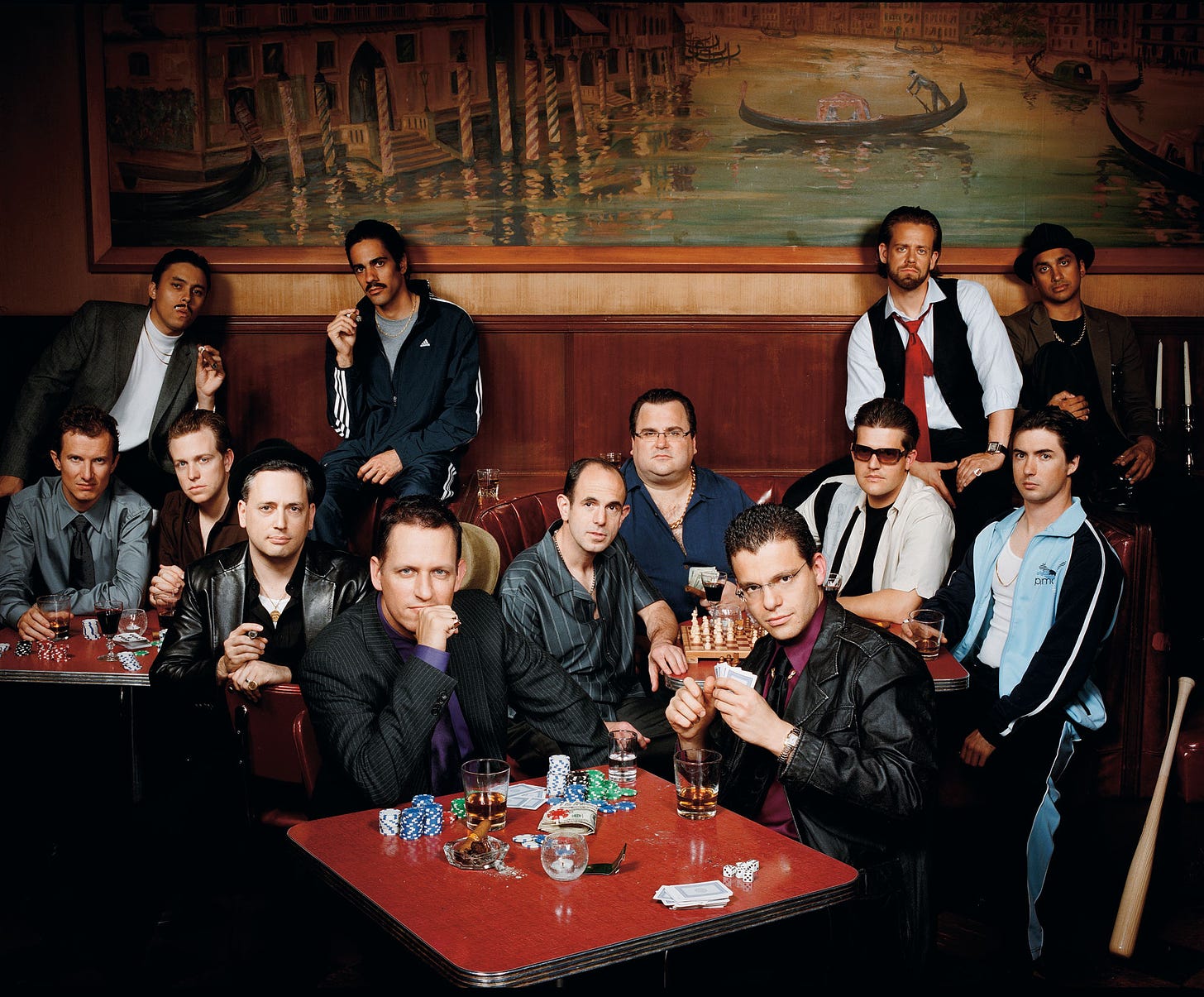 The &quot;paypal mafia&quot; photographed at Tosca in San Francisco, Oct, 2007.Back row from left: Jawed Karim, co-founder Youtube; Jeremy Stoppelman CEO Yelp; Andrew McCormack, managing partner Laiola Restaurant; Premal Shah, Pres of Kiva; 2nd row from left: Luke Nosek, managing partner The Founders Fund; Kenny Howery, managing partner The Founders Fund; David Sacks, CEO Geni and Room 9 Entertainment; Peter Thiel, CEO Clarium Capital and Founders Fund; Keith Rabois, VP BIz Dev at Slide and original Youtube Investor; Reid Hoffman, Founder Linkedin; Max Levchin, CEO Slide; Roelof Botha, partner Sequoia Capital; Russel Simmons, CTO and co-founder of Yelp