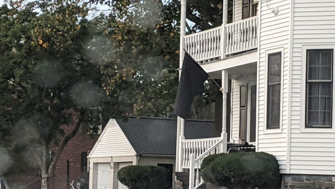 Black flag seen flying at a house in Perkasie.