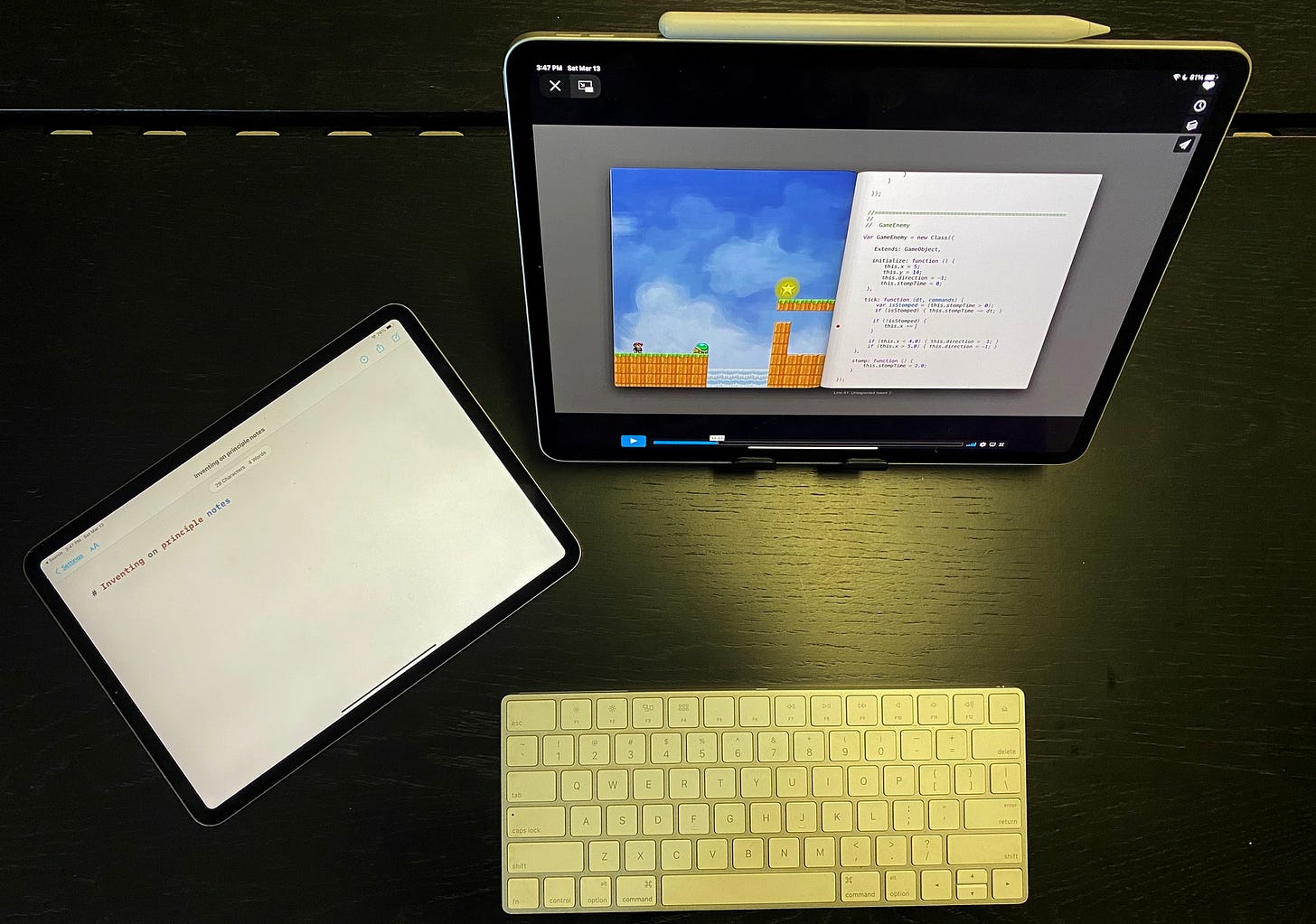 Photo of two iPads and a keyboard