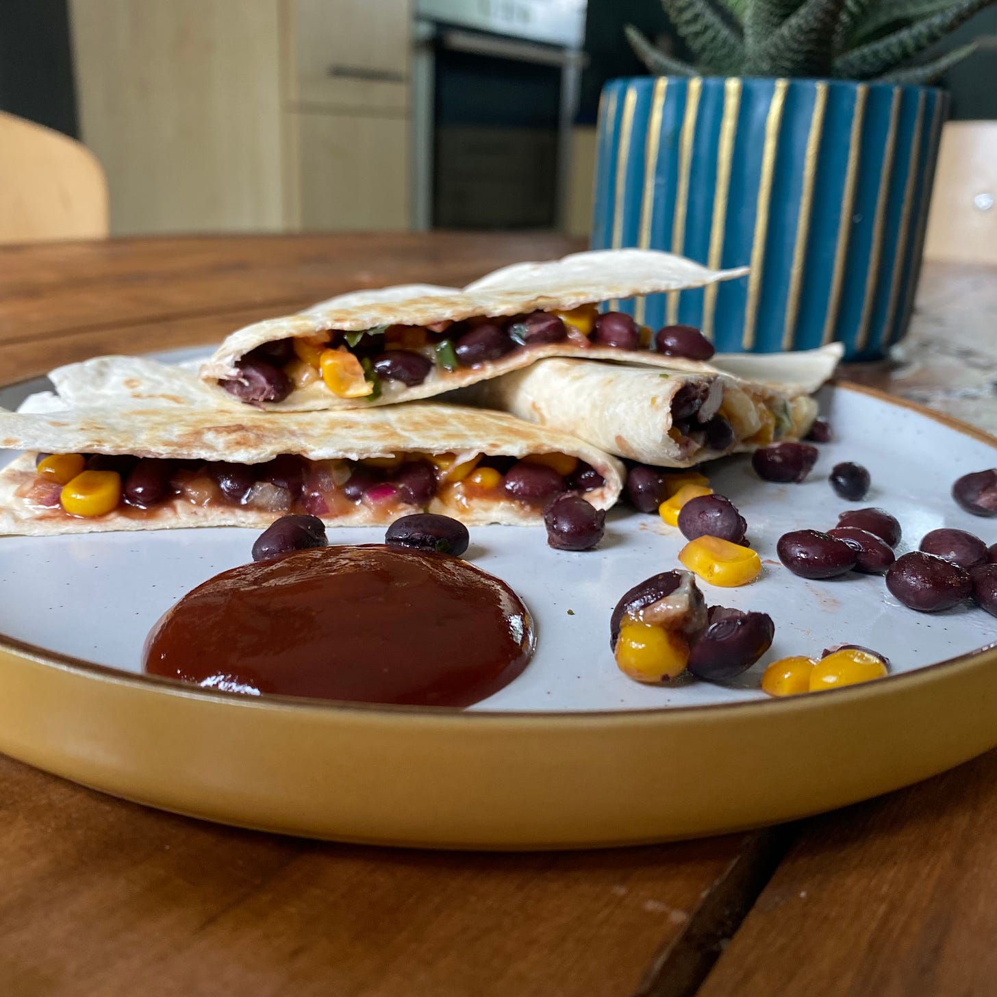 plate with black bean and sweetcorn quesadilla