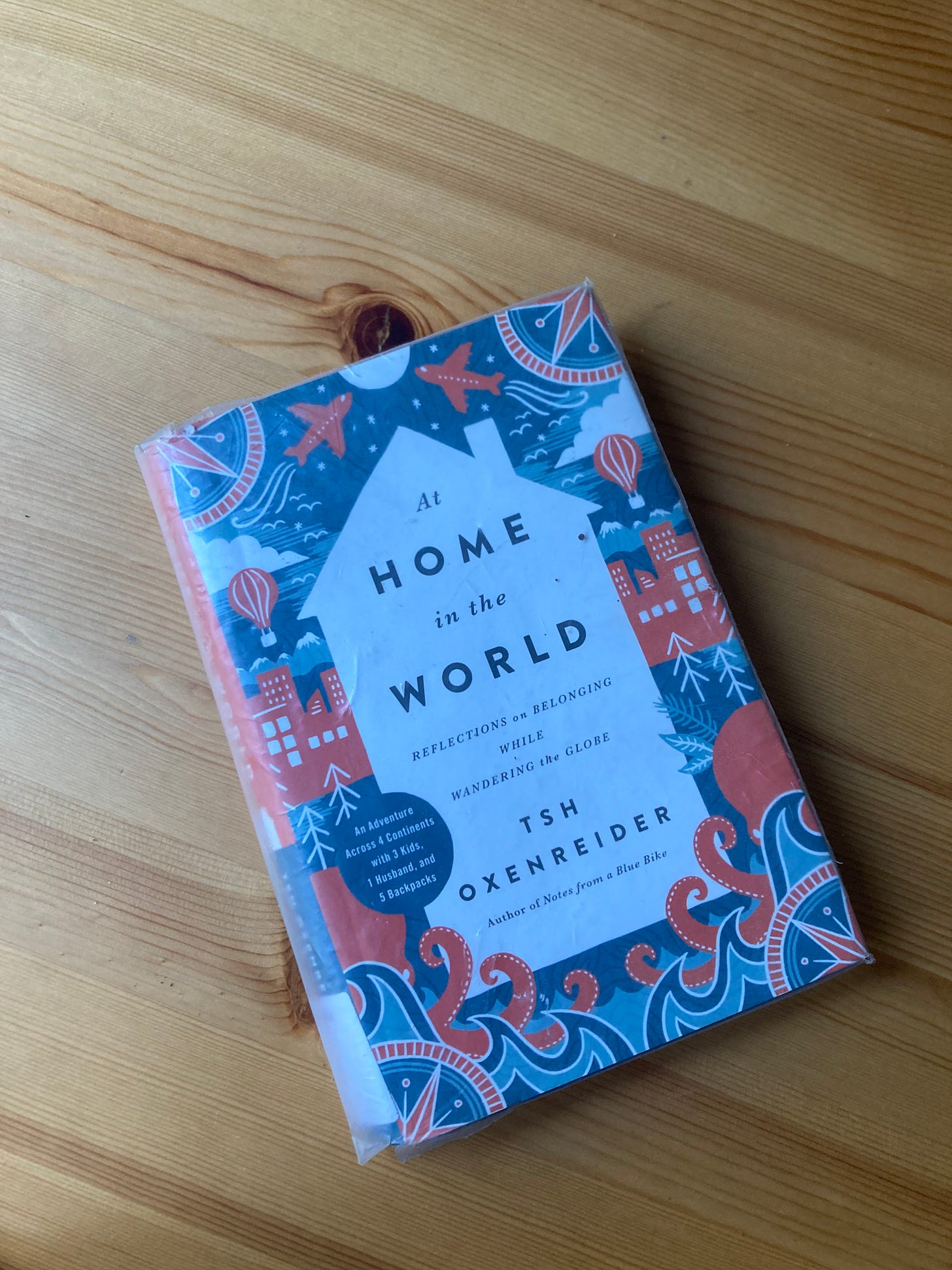Book cover for At Home in the World by Tsh Oxenreider.