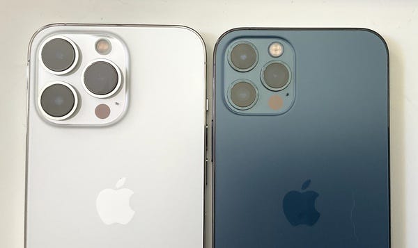 The iPhone 13 Pro is on the left.