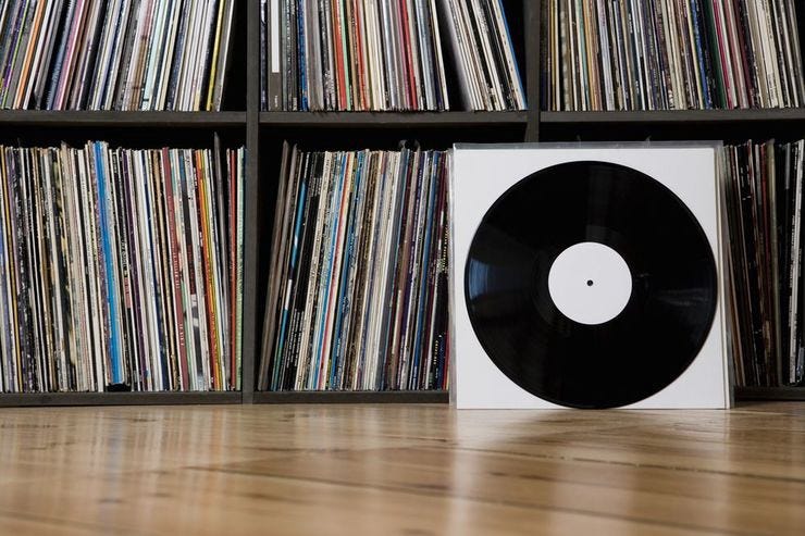 Records leaning against shelves royalty free image 78766282 1551402325