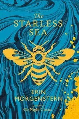 Cover of The Starless Sea — Swirling blue & black background with a yellow bee “stamp”