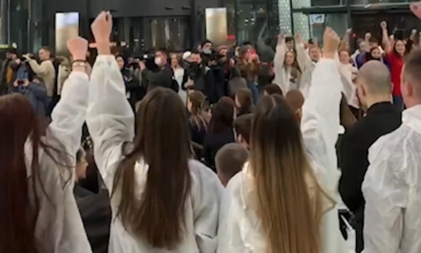 Brainwashed 'patriotic flash mob' of Russian students wearing 'Z' coats  stage pro-war rally | Daily Mail Online