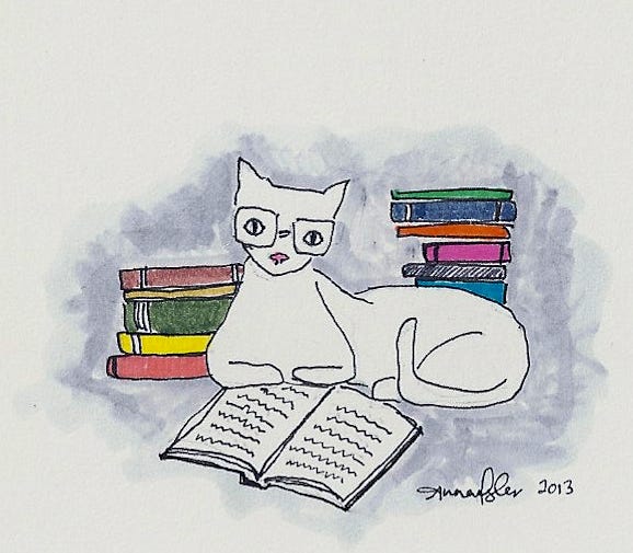 cat reading books | Lev Hardware