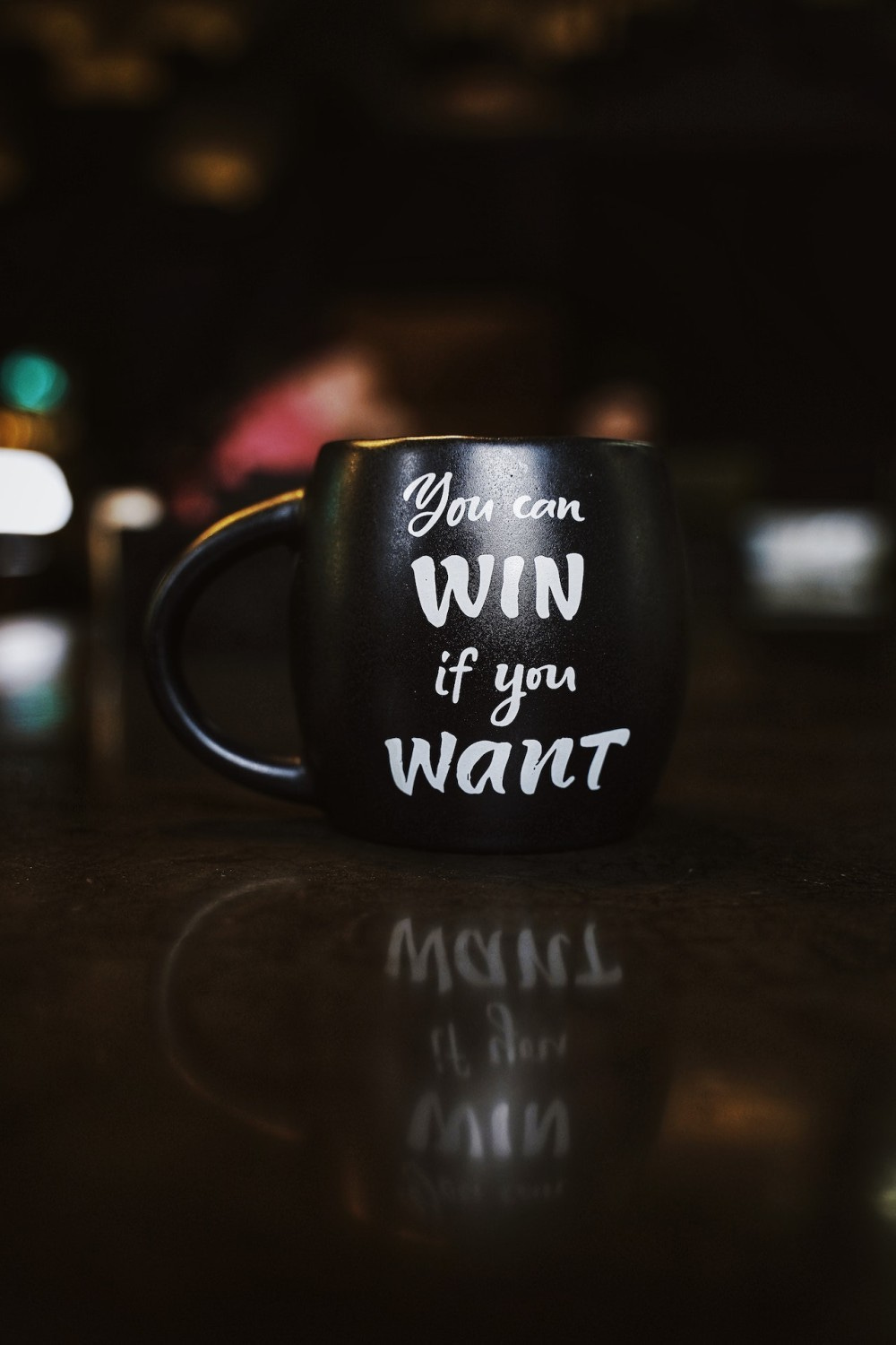 Coffee mug with "You can win if you want"​ written on it
