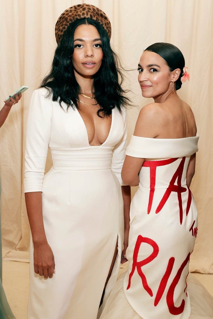 Aurora James and Alexandria Ocasio-Cortez attend The 2021 Met Gala Celebrating In America: A Lexicon Of Fashion at Metropolitan Museum of Art on September 13, 2021 in New York City.