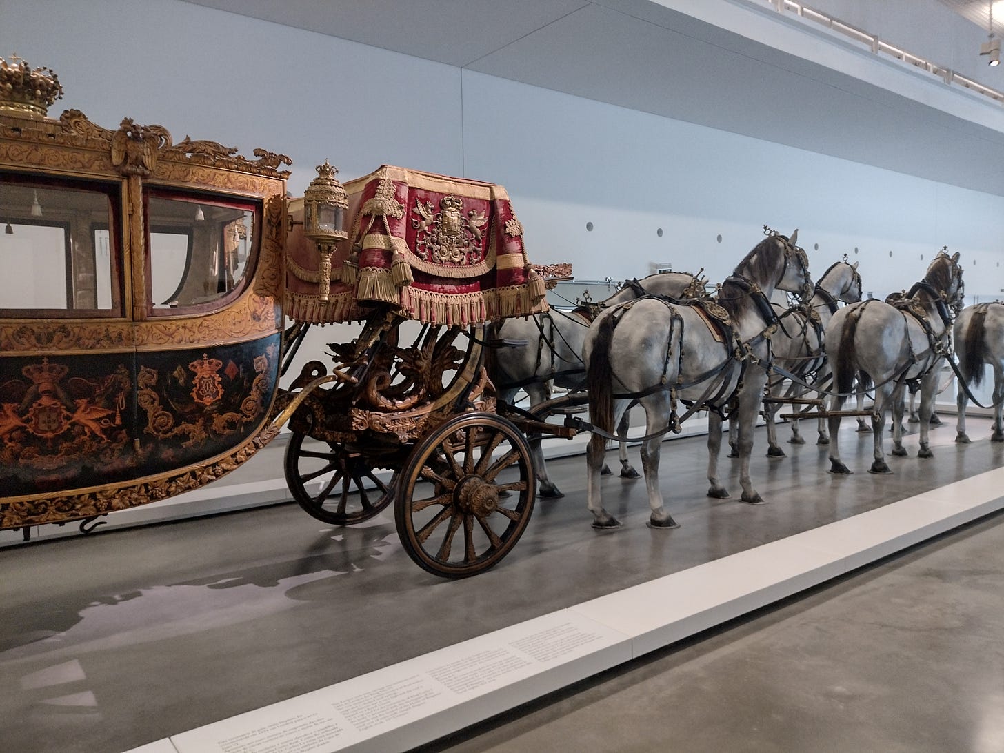 Image of the Crown State Carriage and horses.