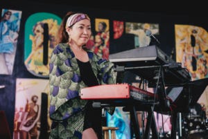 Keiko Komaki performs with Neo Tokyo 2020