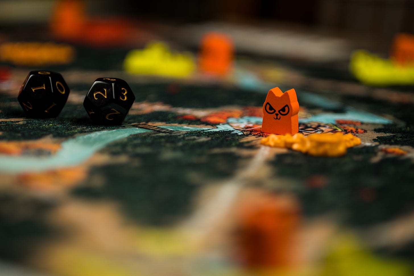 A cat token is placed in a clearing in the board game Root.