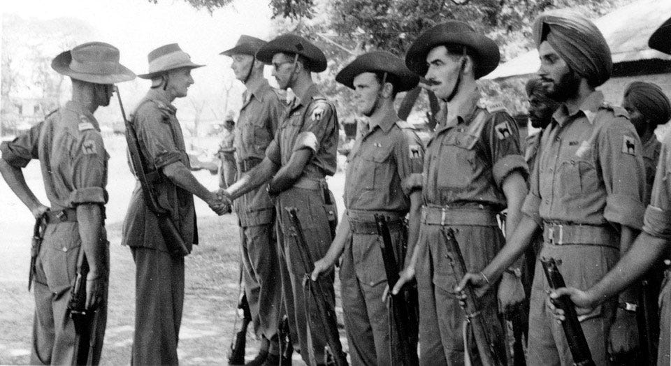 Major-General Sir Frank Messervy inspecting troops, 1944 (c) National Army Museum 1974-09-79-127