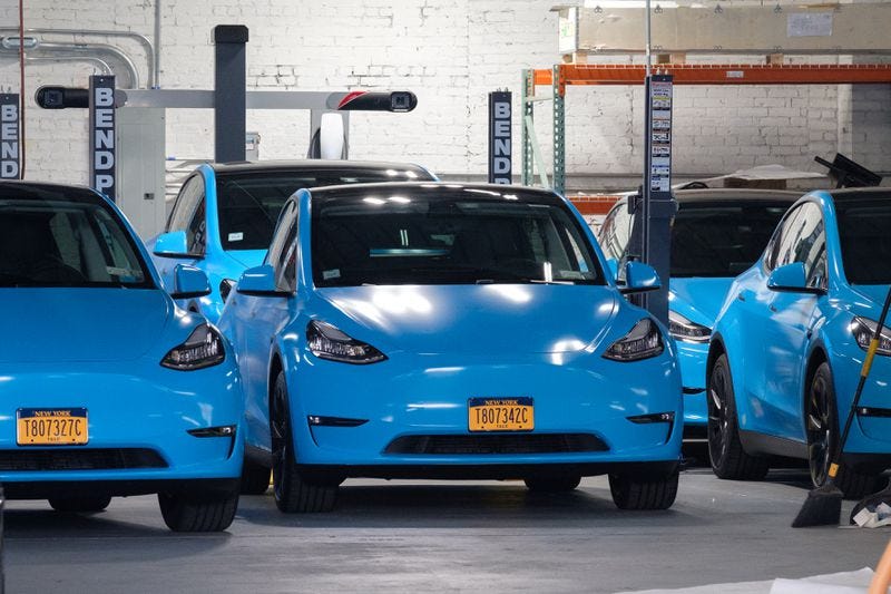 Tesla taxis with TLC license plates at a Revel garage in Red Hook, Brooklyn.