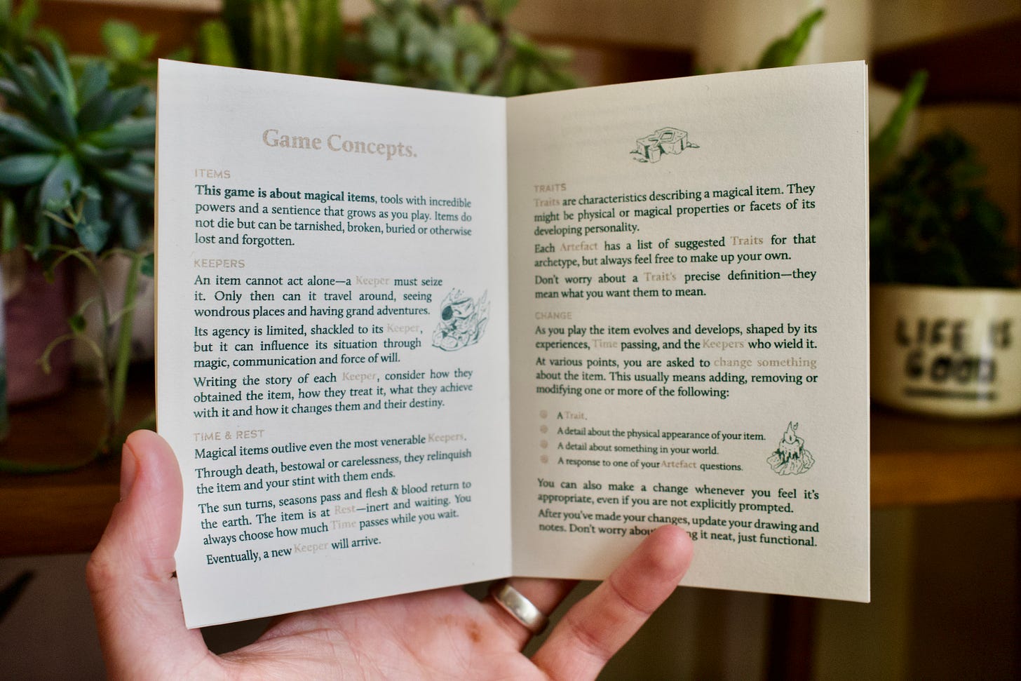 A spread from the Artefact beak zine, showing the 'Game Concepts' pages. The zine is printed on creamy white paper with gold and green ink.