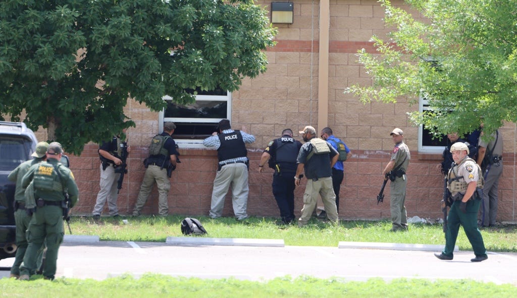 Law enforcement work during a mass shooting at Robb Elementary School.