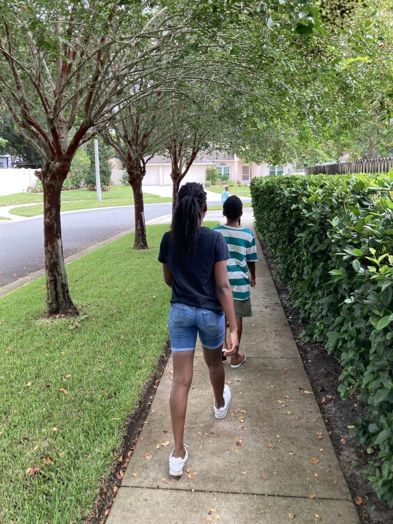 Prayer Walking, Children walking in from of parents in neighborhood to pray together