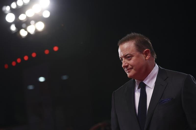Brendan Fraser poses for photographers upon arrival at the premiere of the film 'The Whale' during the 79th edition of the Venice Film Festival in Venice, Italy, Sunday, Sept. 4, 2022. (Photo by Vianney Le Caer/Invision/AP)