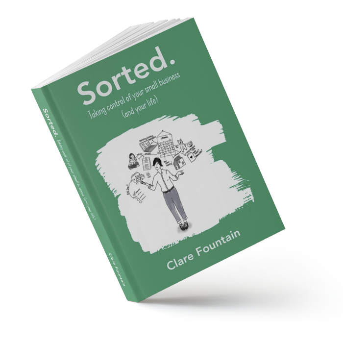 The book, Sorted. Taking Control of Your Small Business (and Your Life) by Clare Fountain, standing on one end at an angle.
