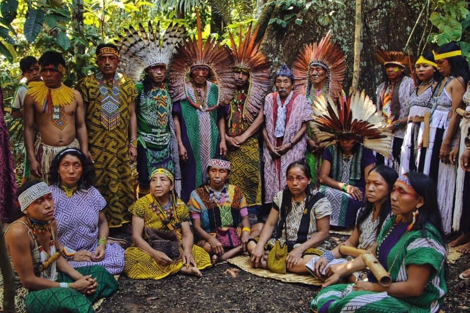 An indigenous tribe assembled in a circle