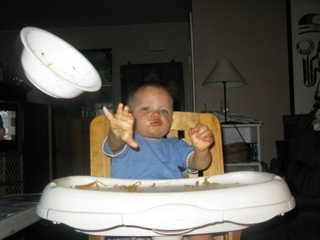 Baby in high chair smugly throwing food bowl. (Credit goes to Lynn from  Seattle) : r/photoshopbattles