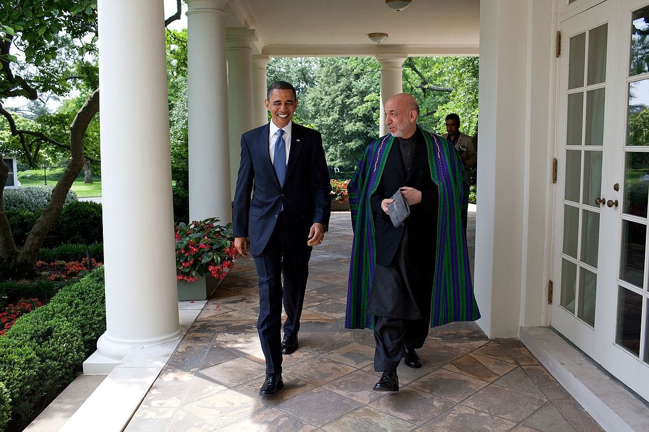 https://upload.wikimedia.org/wikipedia/commons/thumb/3/31/President_Obama_and_Afghan_President_Karzai_Walk_Along_the_Colonnade_%284643671978%29.jpg/1280px-President_Obama_and_Afghan_President_Karzai_Walk_Along_the_Colonnade_%284643671978%29.jpg