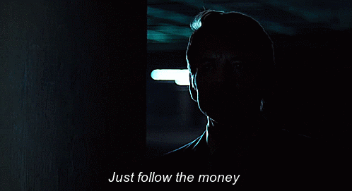 Gif of a scene from All the President's Men, where Deepthroat is telling Bob Woodward to follow the money,