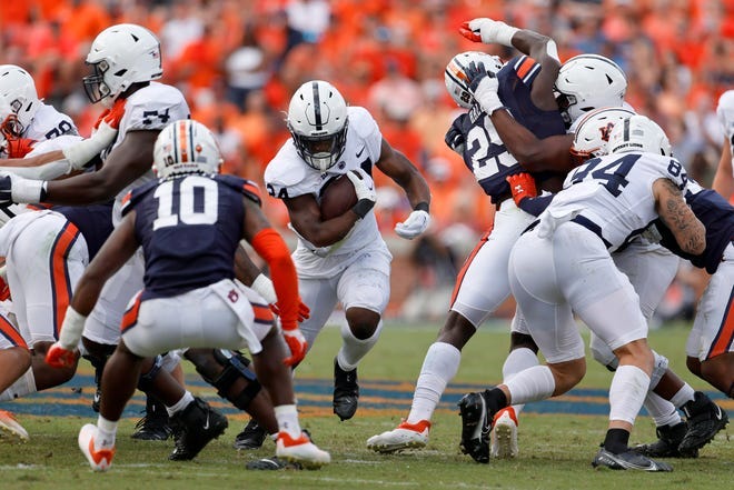 Penn State running back Keyvone Lee (24) finds a opening during the second quarter against Auburn at Jordan-Hare Stadium.