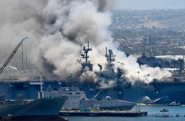 Smoke rising from the U.S.S. Bonhomme Richard after an explosion and fire in 2020. The fire, which left the ship inoperable, took four days to extinguish. 