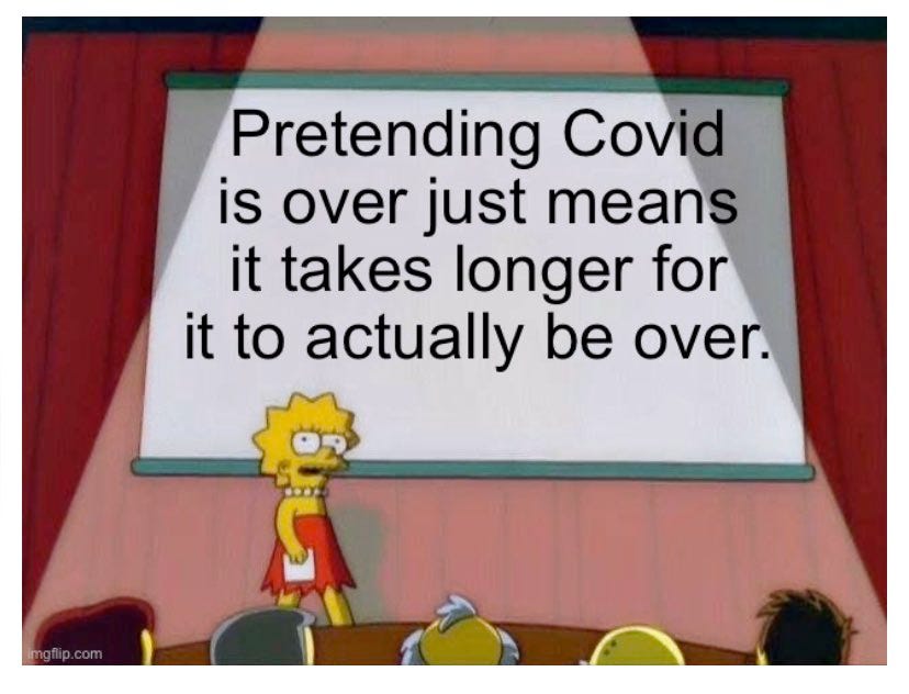 Cartoon character Lisa Simpson is standing in front of an audience on stage with a projection screen behind her that reads Pretending Covid is over just means it takes longer for it to actually be over.