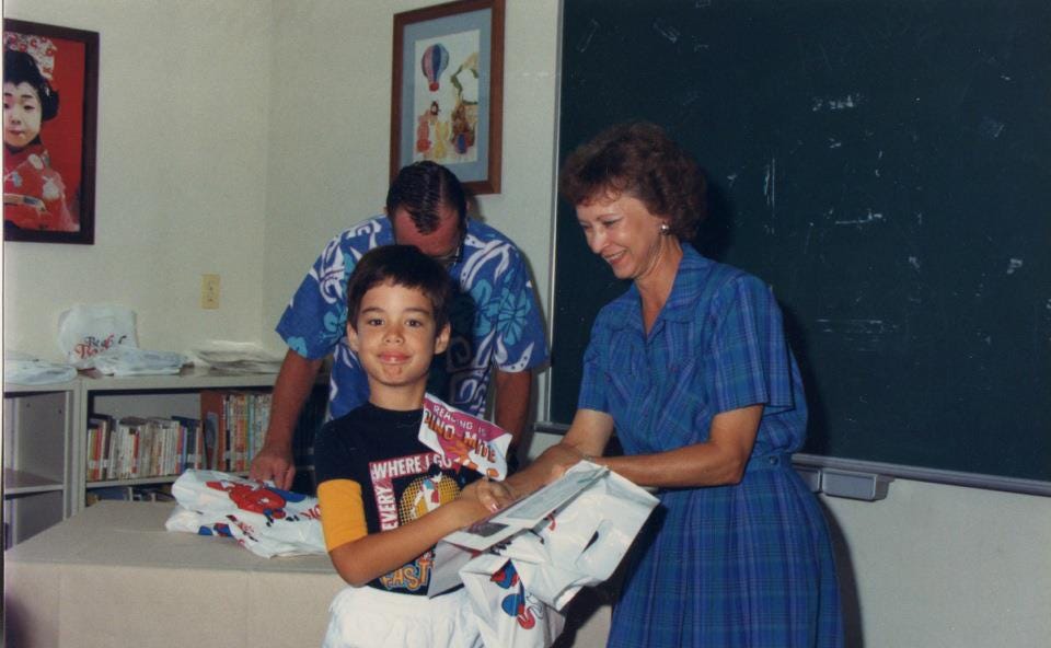 Me in Japan, receiving an award for most books read in a month.