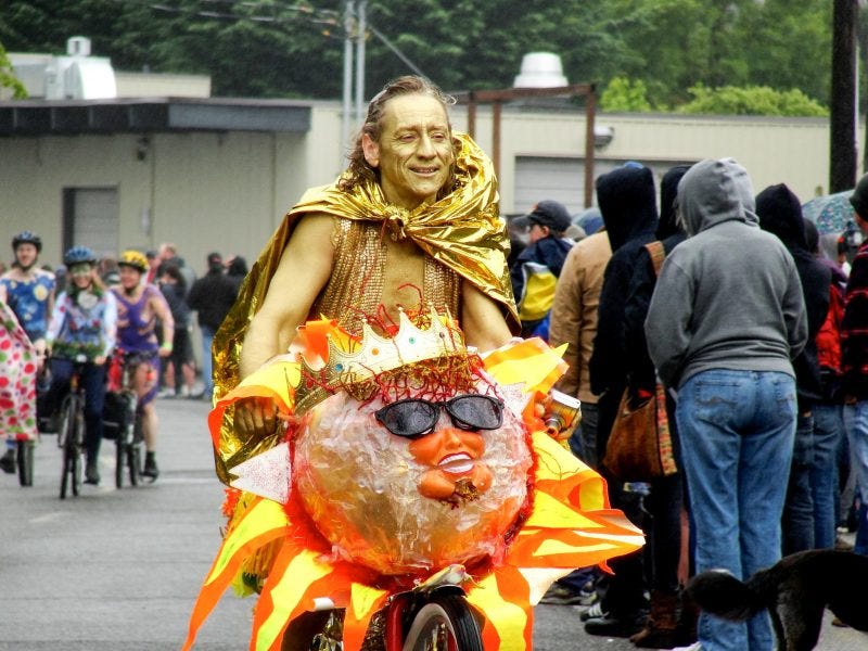Seattle solstice parade - body painting in bicycles
