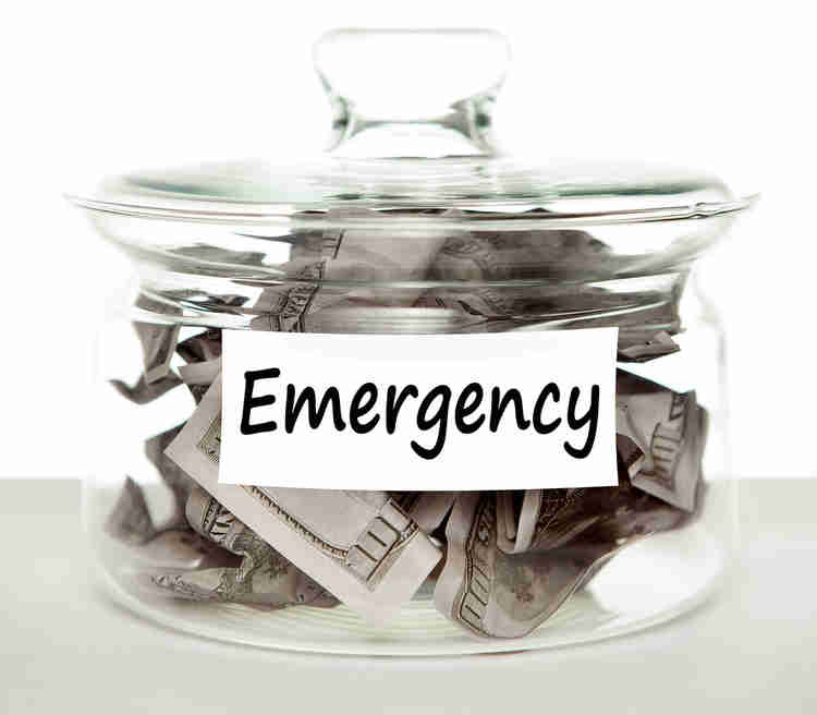A jar filled with money for emergency purpose