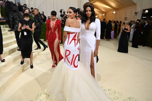 AOC launches &#39;Tax the Rich&#39; political merchandise off Met Gala 2021 dress  controversy