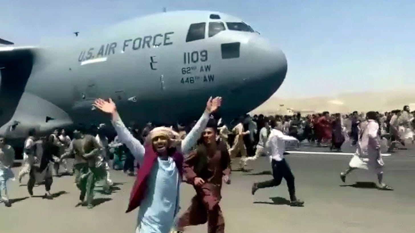 Thousands flock to Afghanistan airport in attempt to flee country as  Taliban take control; 7 killed in airport chaos - ABC7 Chicago