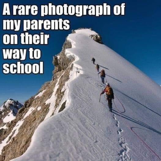 May be an image of mountain and text that says 'A rare photograph of my parents on their way to school'