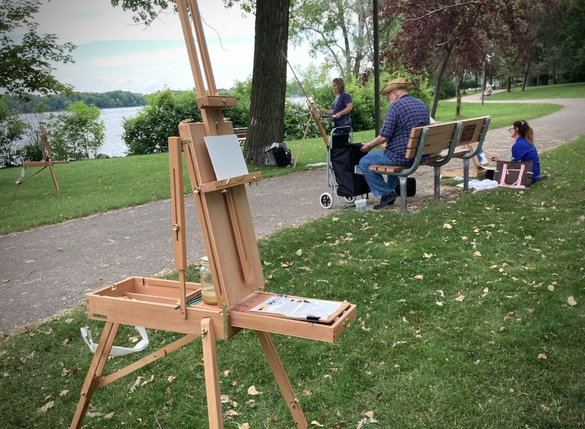 Painters at the park with easels
